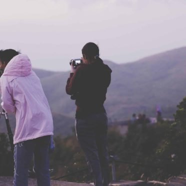 people-photographing-mountains-sunset people-photographing-mountains-sunset